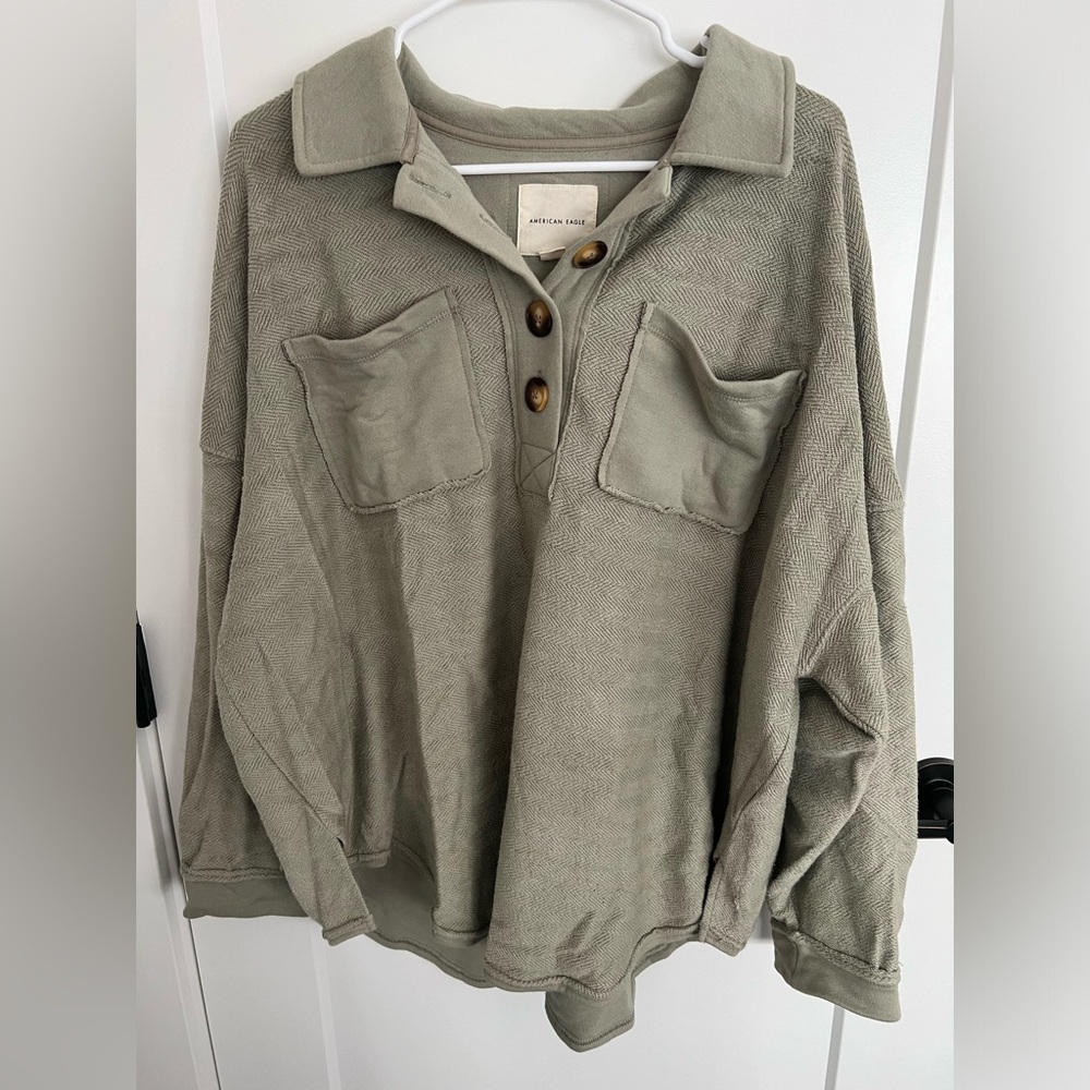 American eagle green Henley style sweatshirt. Size M
